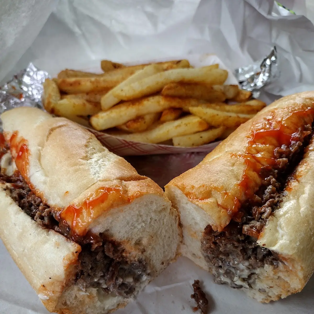 Cheese Steak and Old Bay Fries