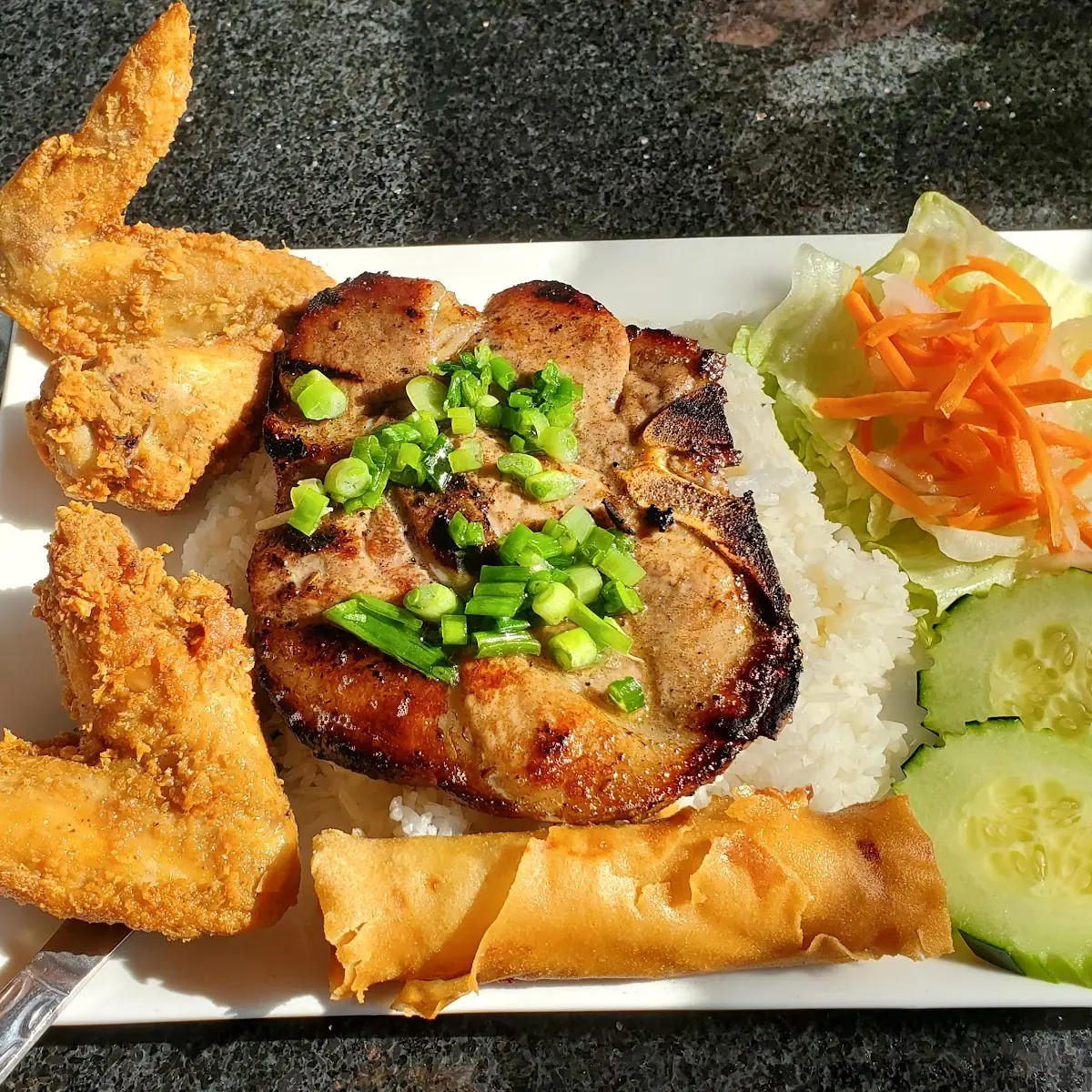 Pork Chop Chicken Wing Egg Roll Combination Plate