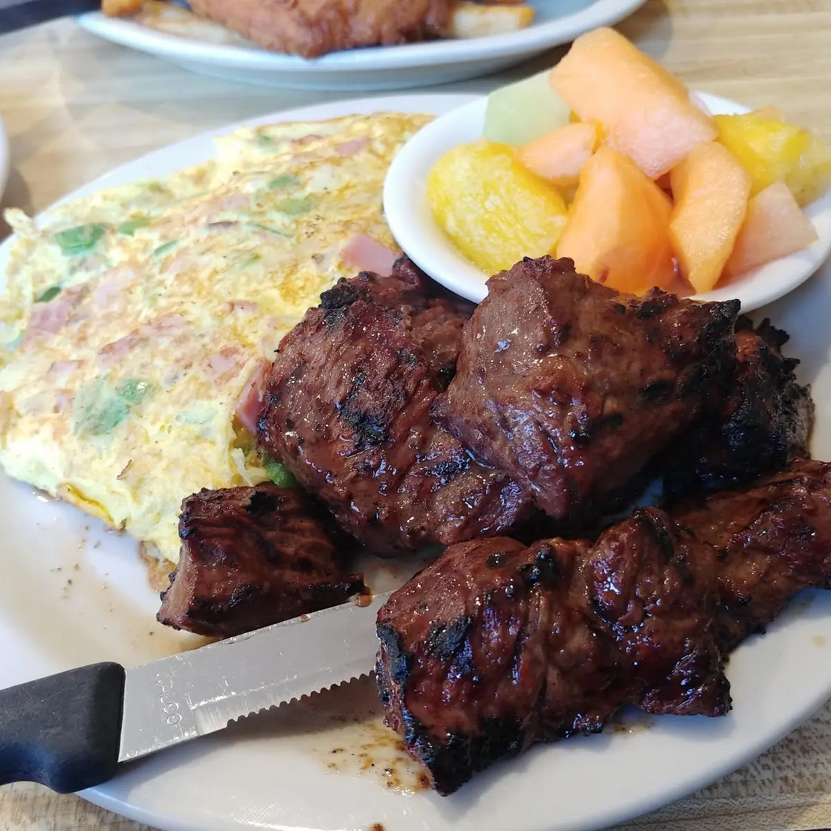 Steak Tips and Omlette with a Fruit Salad