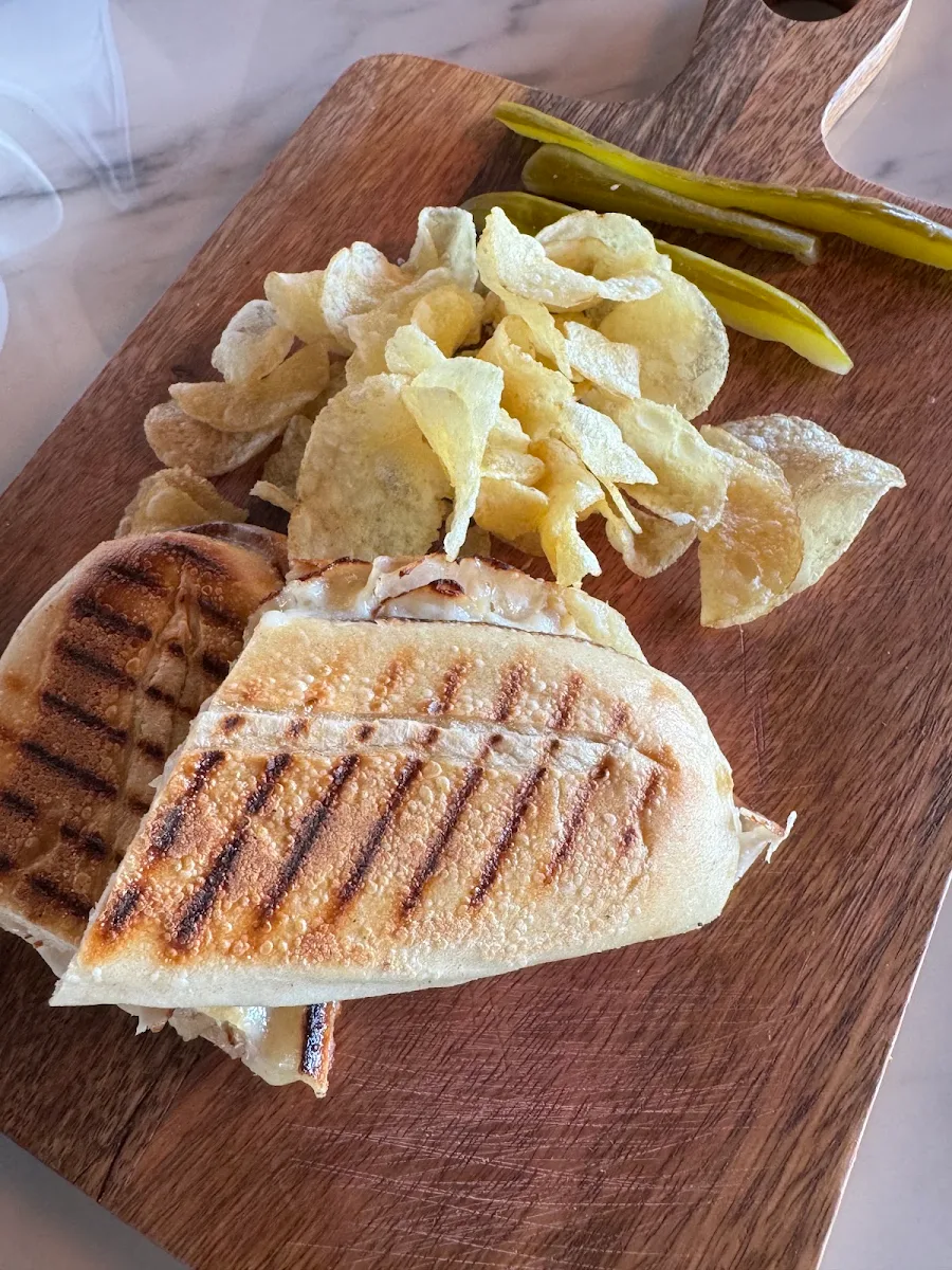 Grilled Chicken Avocado Sandwich and Chips