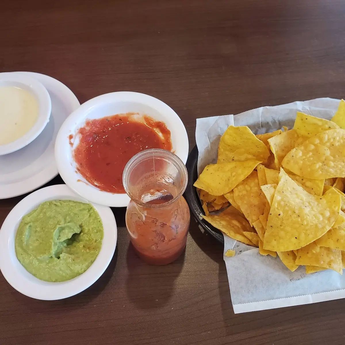 Chips Salsa Guacamole and Cheese Dip