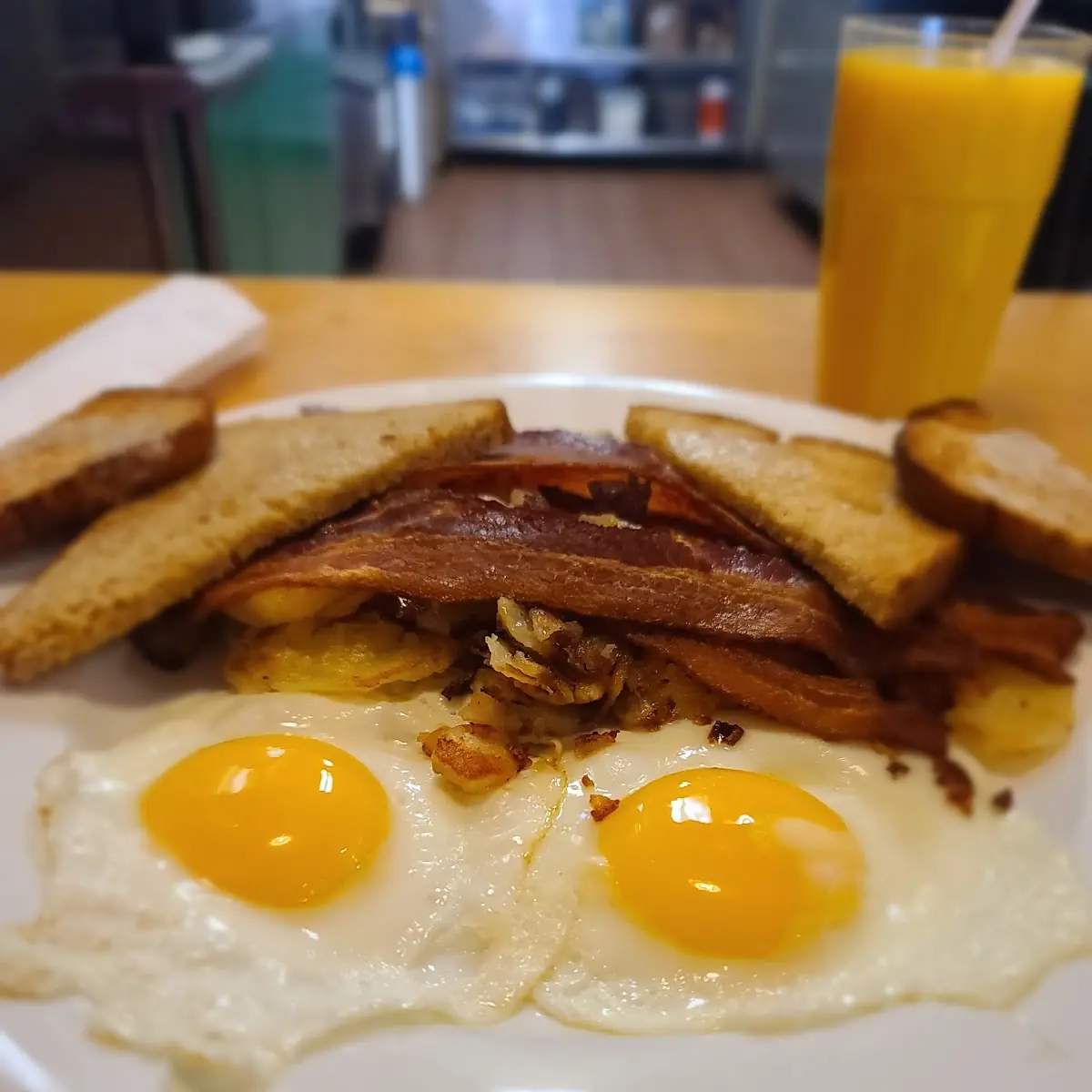 2 Buttermilk Pancakes 2 Eggs with Breakfast Meat