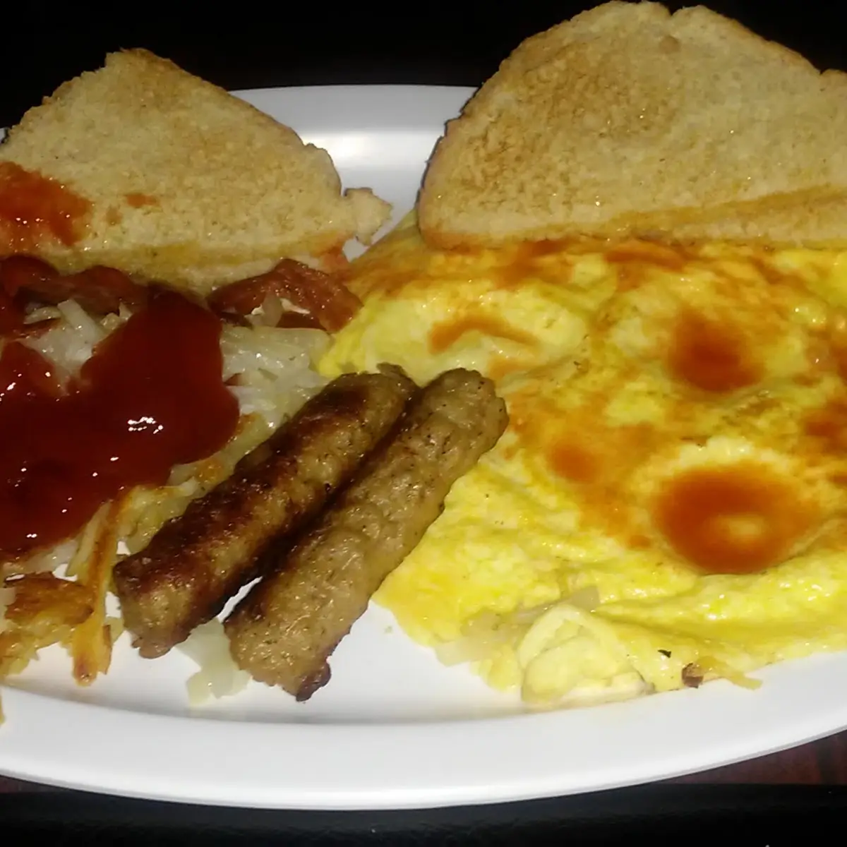 Free Breakfast Includes Eggs Bacon Sausage Links Hash Browns with Purchase of Any Drink