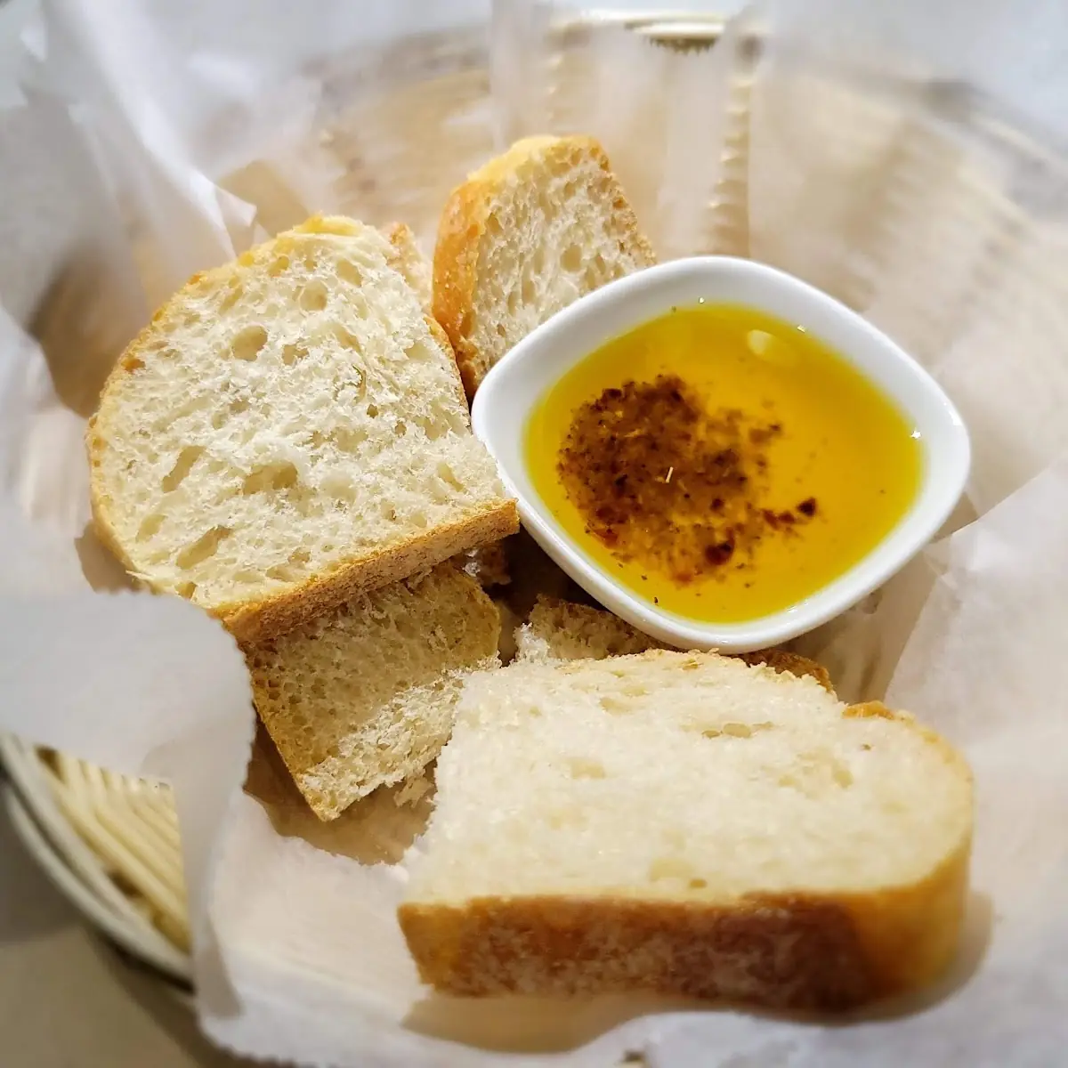 Bread Basket with Oil and Herbs