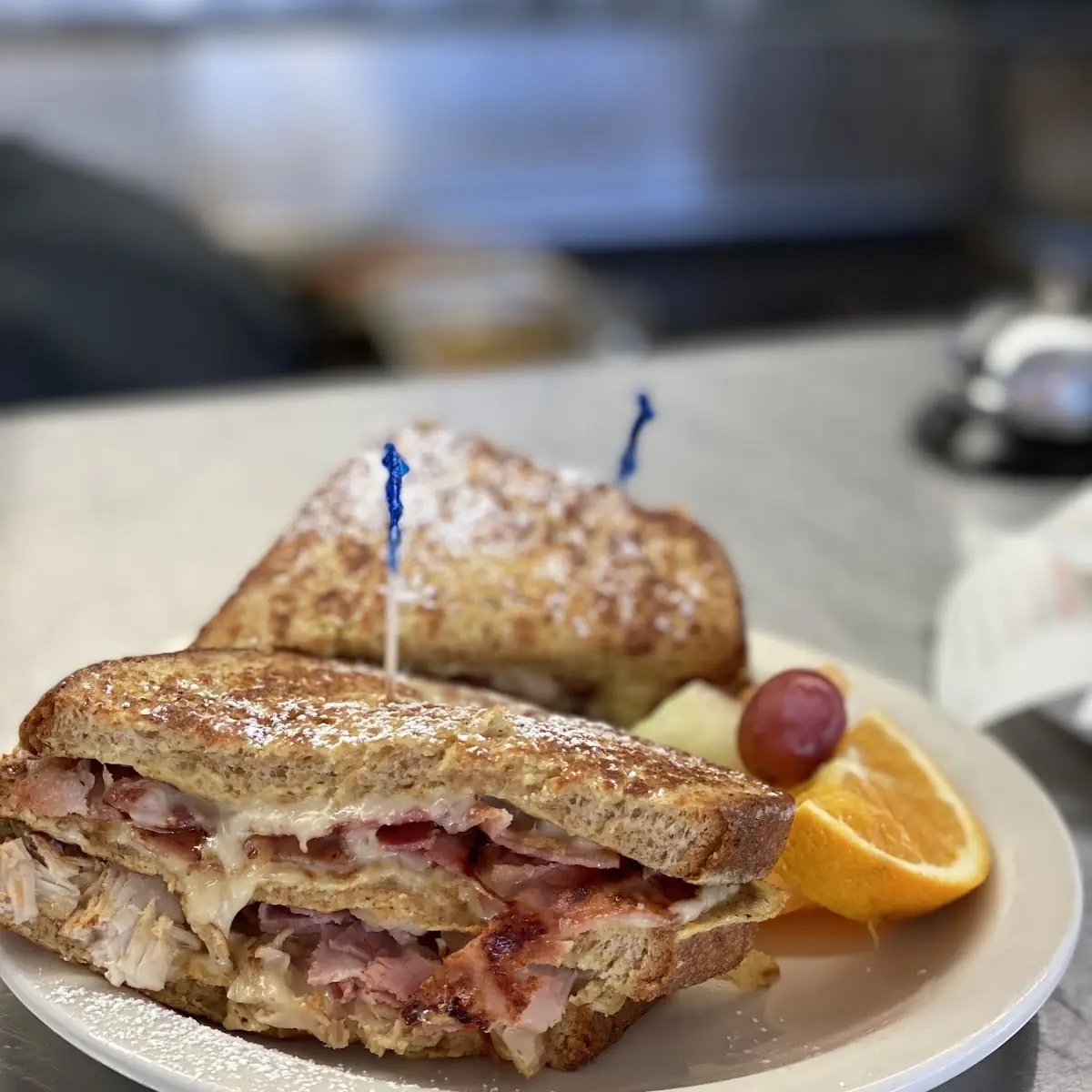 Monte Christo Breakfast Sandwich Triple Decker Dipped with Ham Chicken Bacon and Cheese No Potato