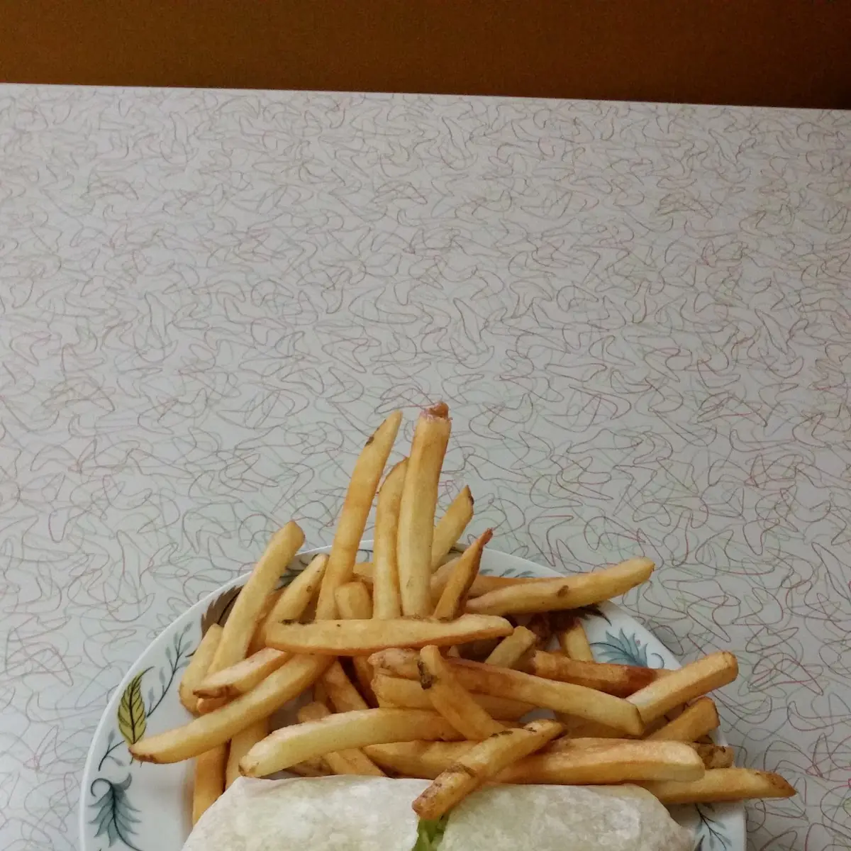 Chicken Wrap Which Fries, Basell’s Restaurant & Tavern