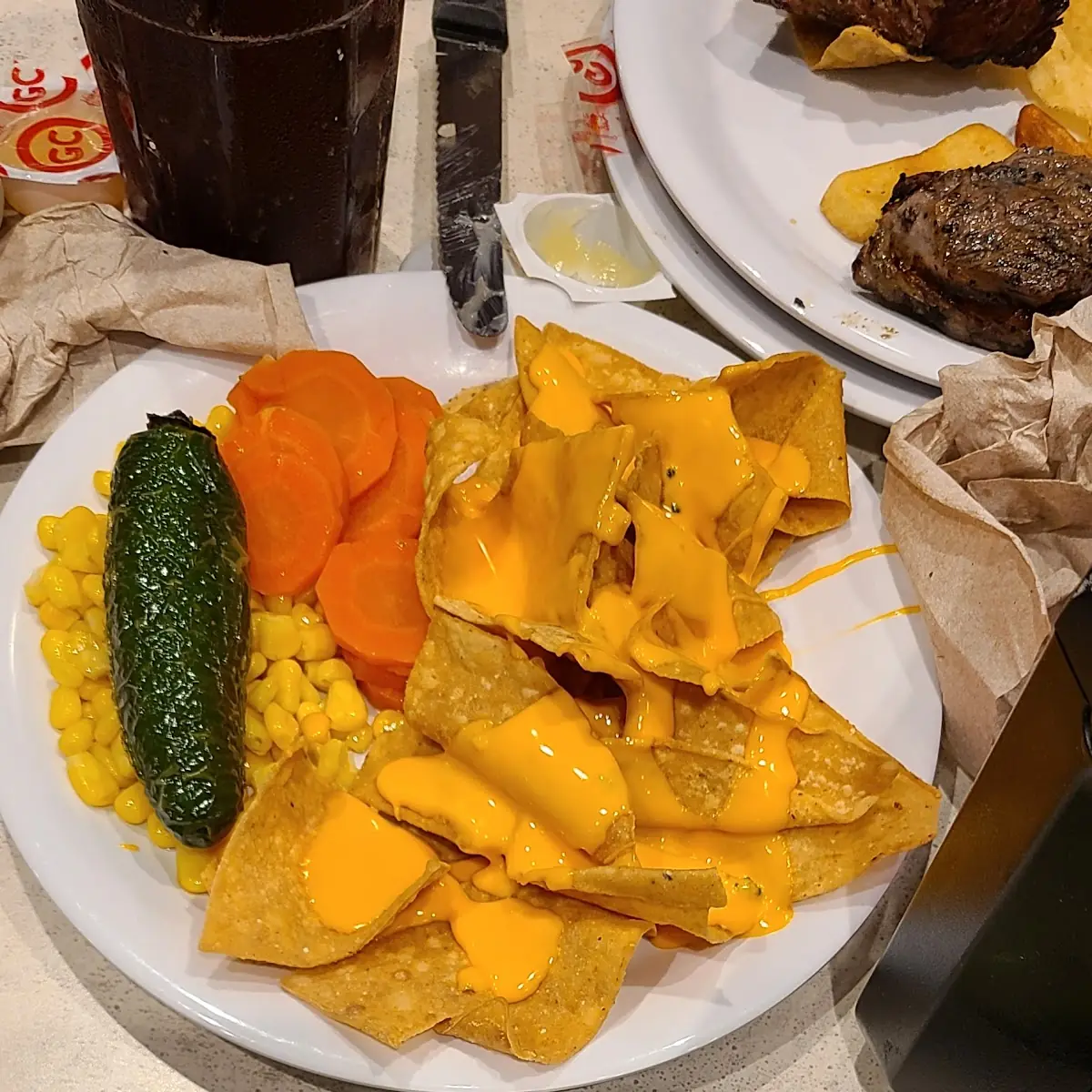 Salad and Nacho Cheese Carrots Cucumbers Jalapeño Corn