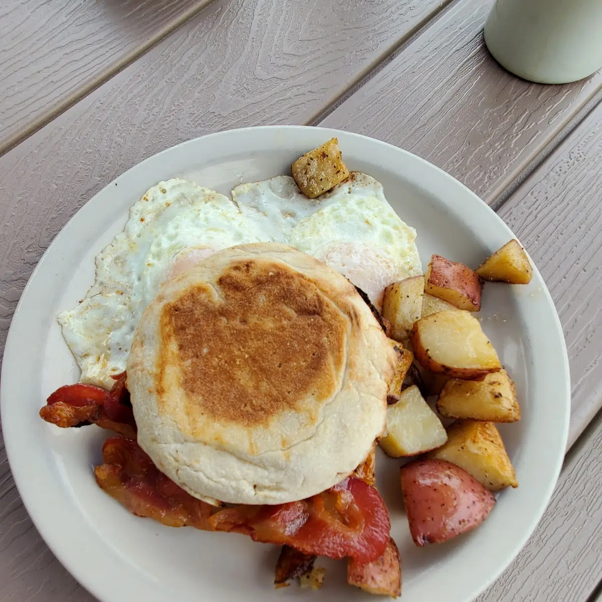 Eggs over Medium Hash Fries Bacon & English Muffin