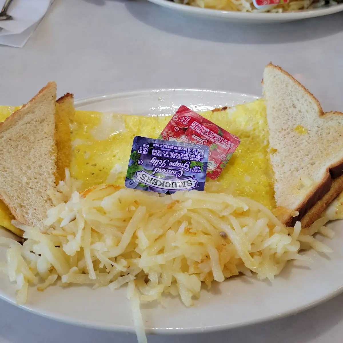 Three Egg Bacon & Cheese Omelette with Hash Browns Toast