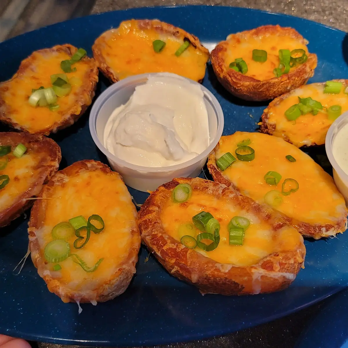 Stuffed Potato Skins w Pulled Pork Sour Cream & Ranch