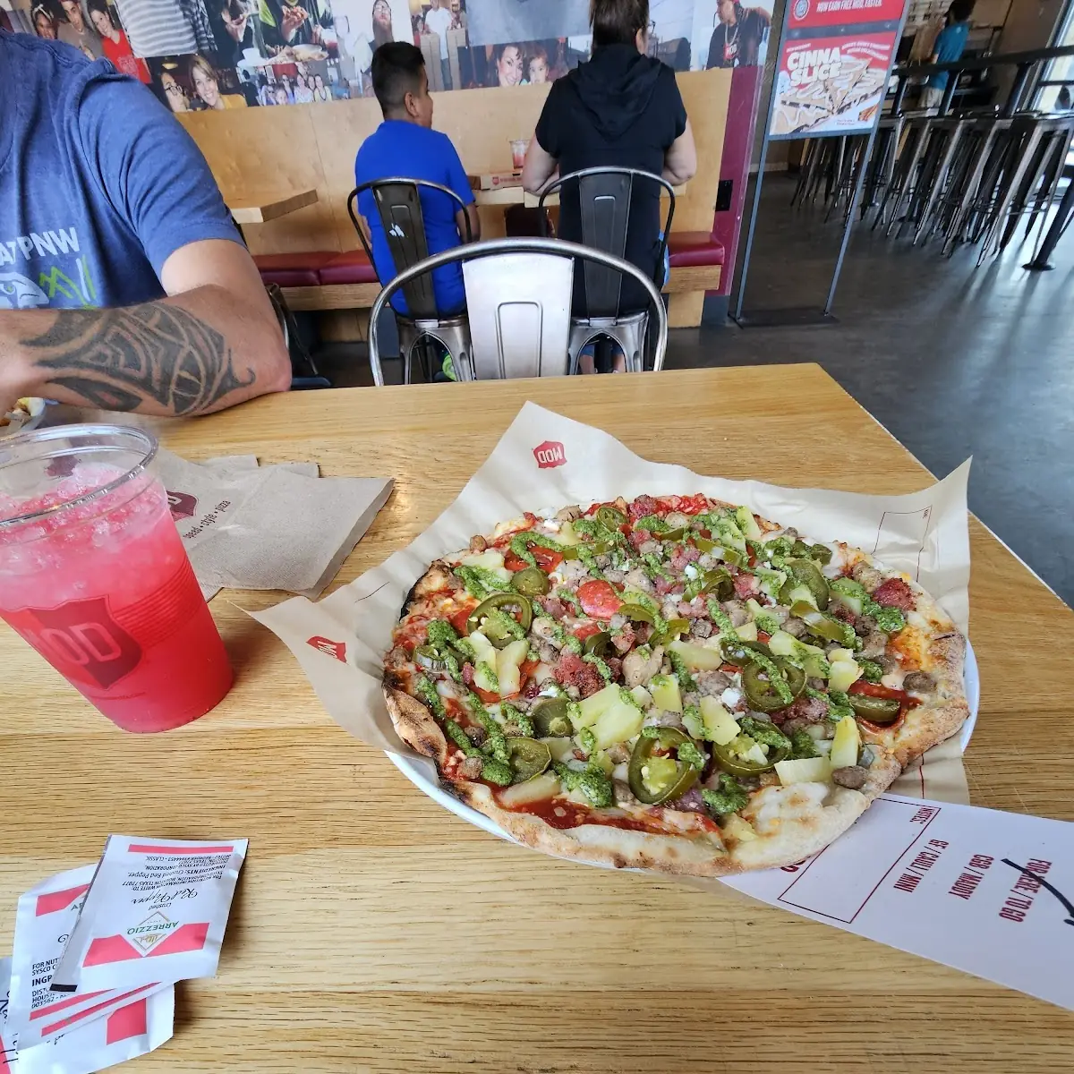 Meat Lovers All the Cheese Jalapeños Pineapple and Pesto Drizzle