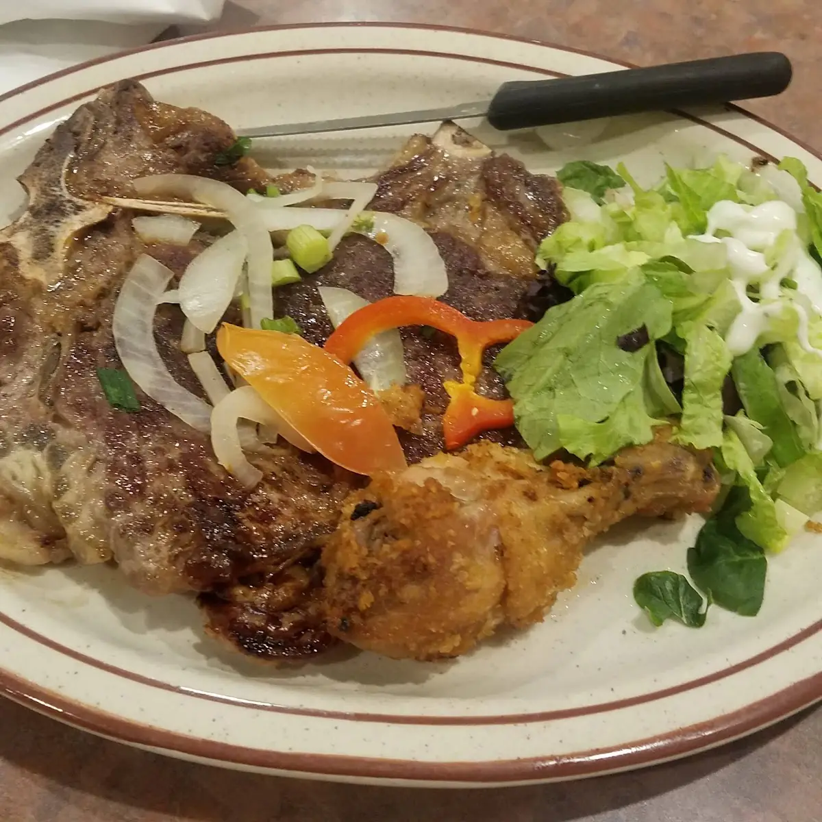 T Bone Steak with Additional Fried Chicken Leg