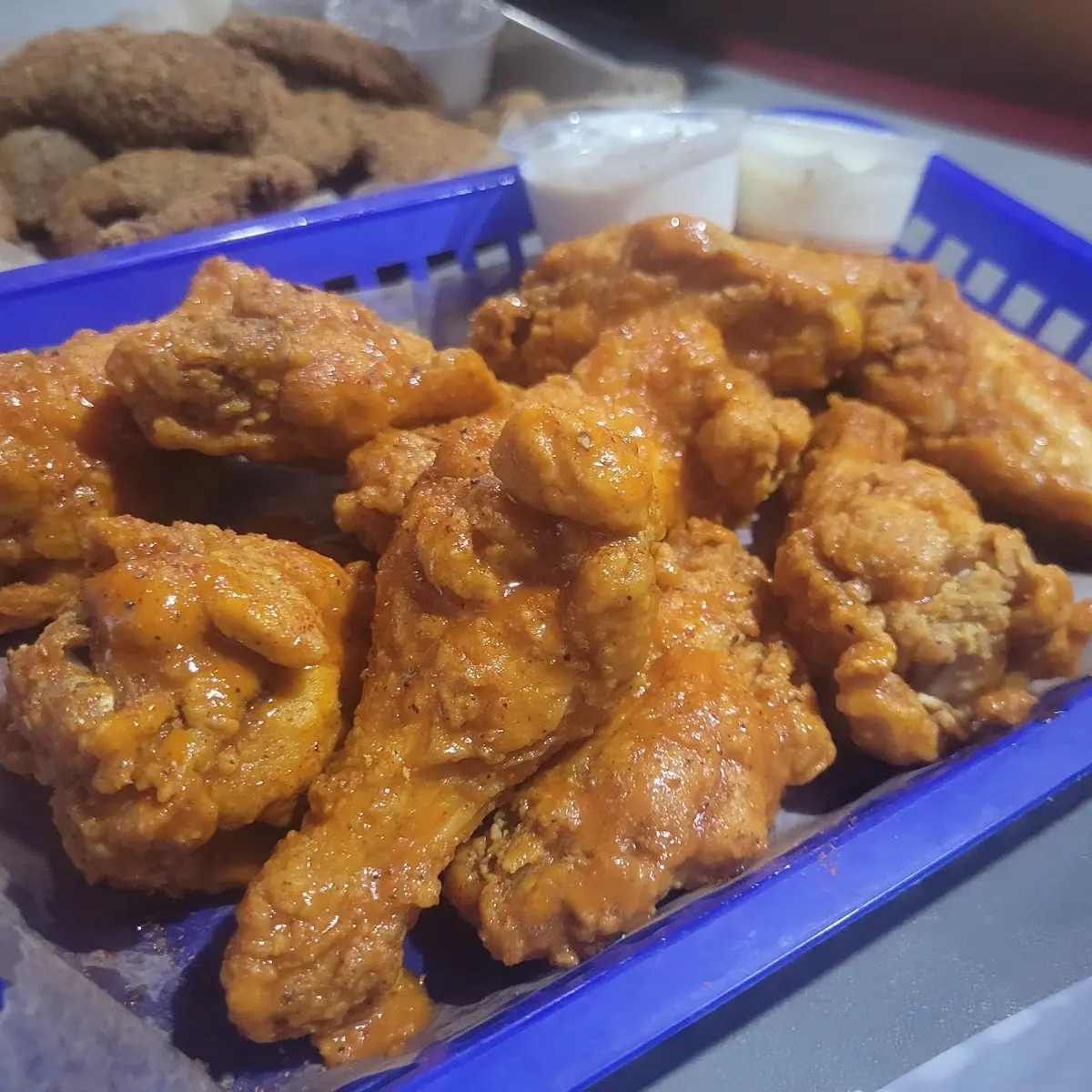 Cajun Dusted Appetizer Wings Tossed in Buffalo Sauce
