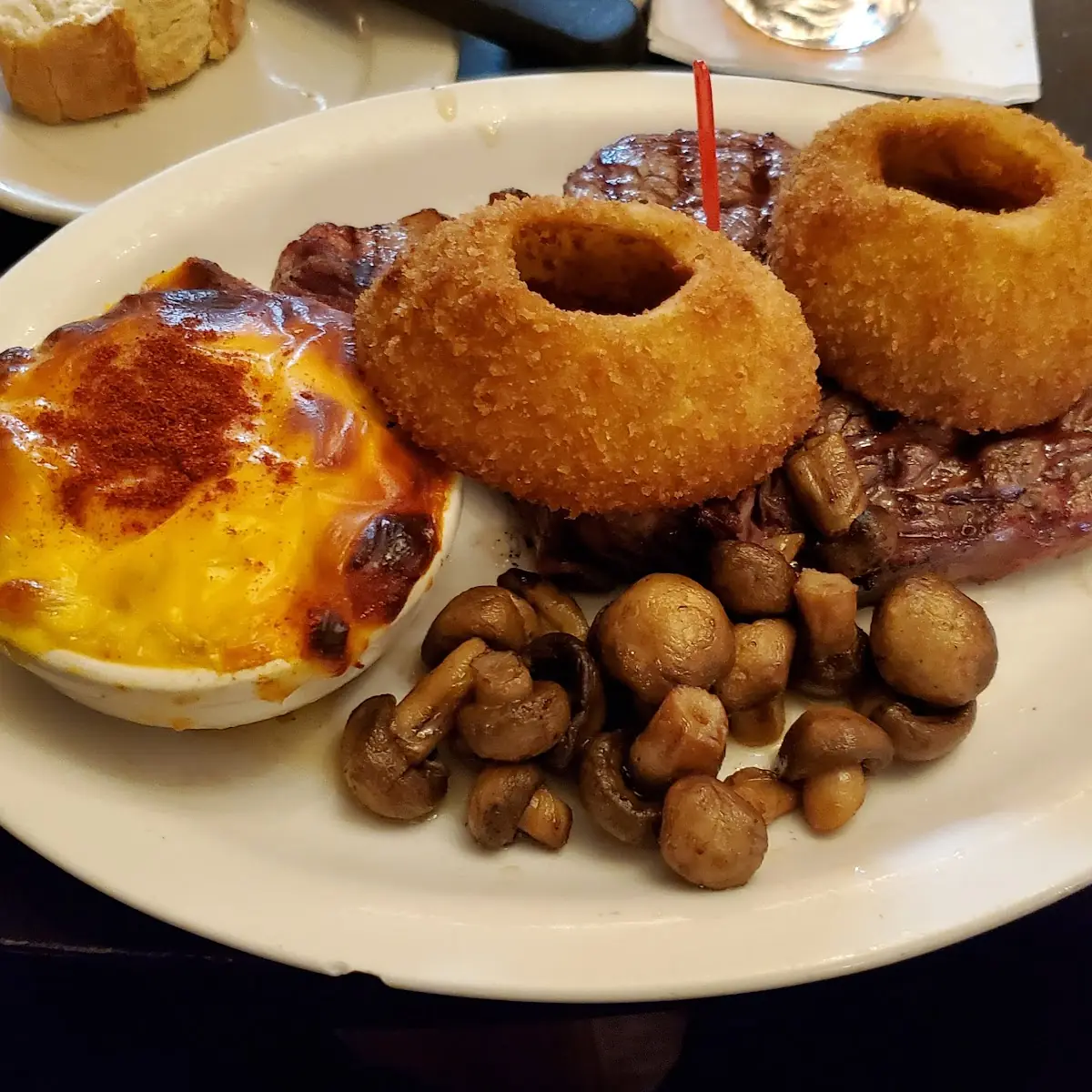 Bone in Ribeye with Potatoes Au Gratin