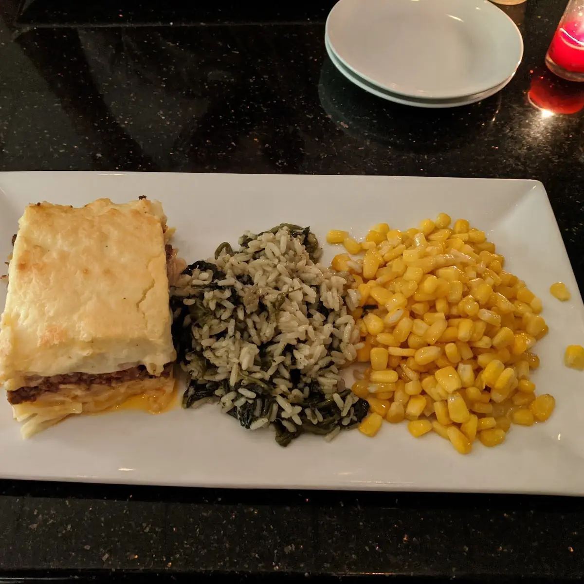 Pastichio Dinner with Sweet Corn and Spinach and Rice