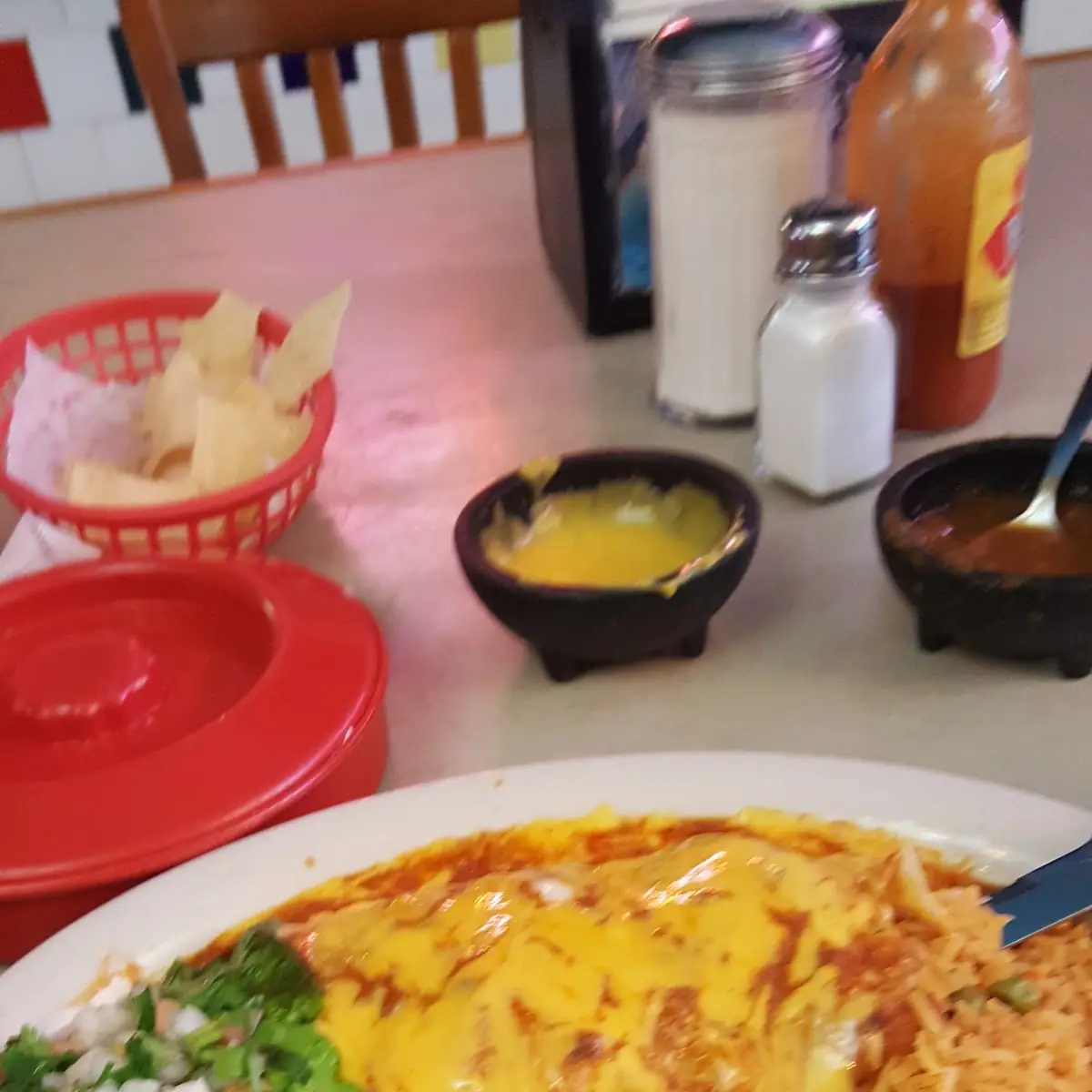 T-Bone Steak with Rice Beans and Enchilada