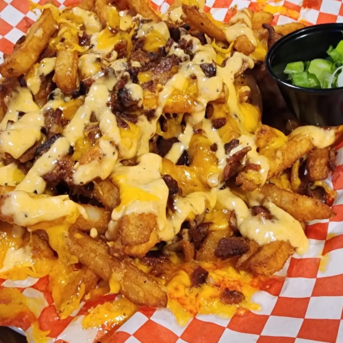 Pulled Pork Nachos with Cheese and Sauce