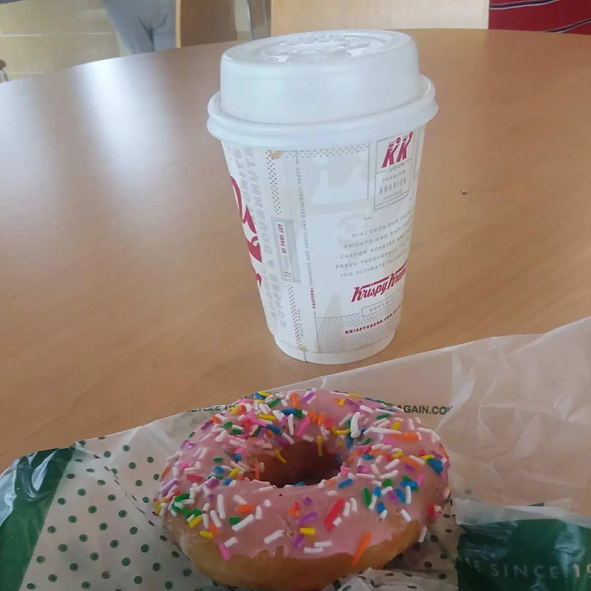 Strawberry Frosting with Sprinkles Donut