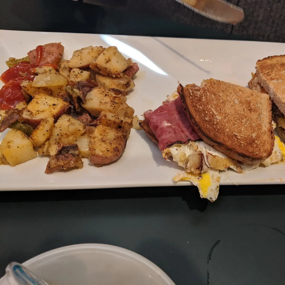 Pastrami Egg & Cheese on Sour Dough