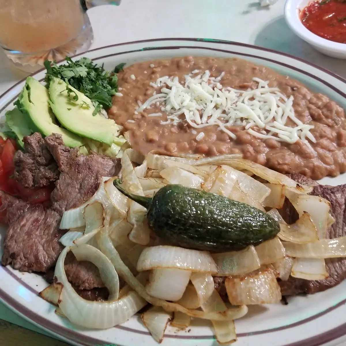 Bistec Encebollado