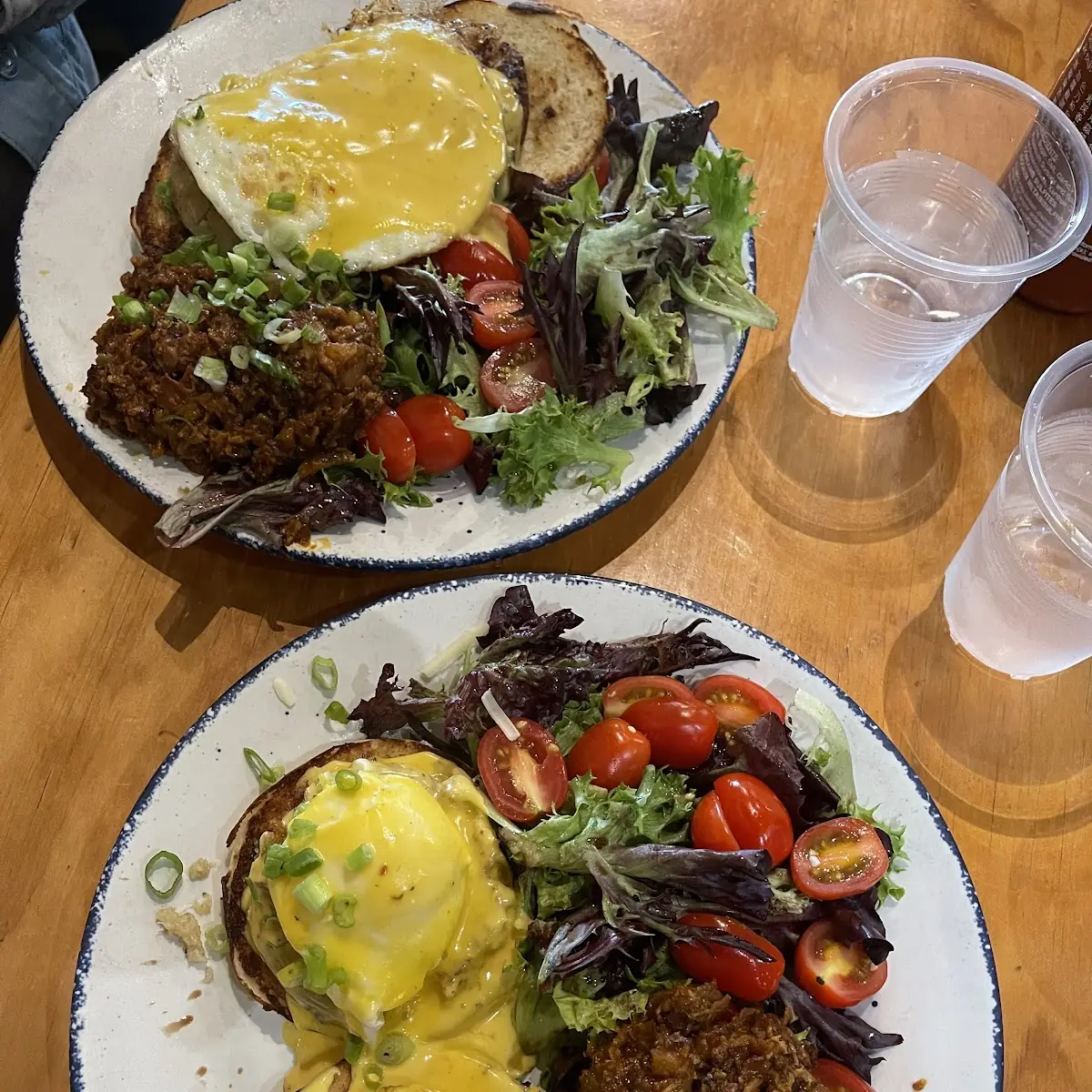 Eggs Benedict with Pulled Pork and Salad