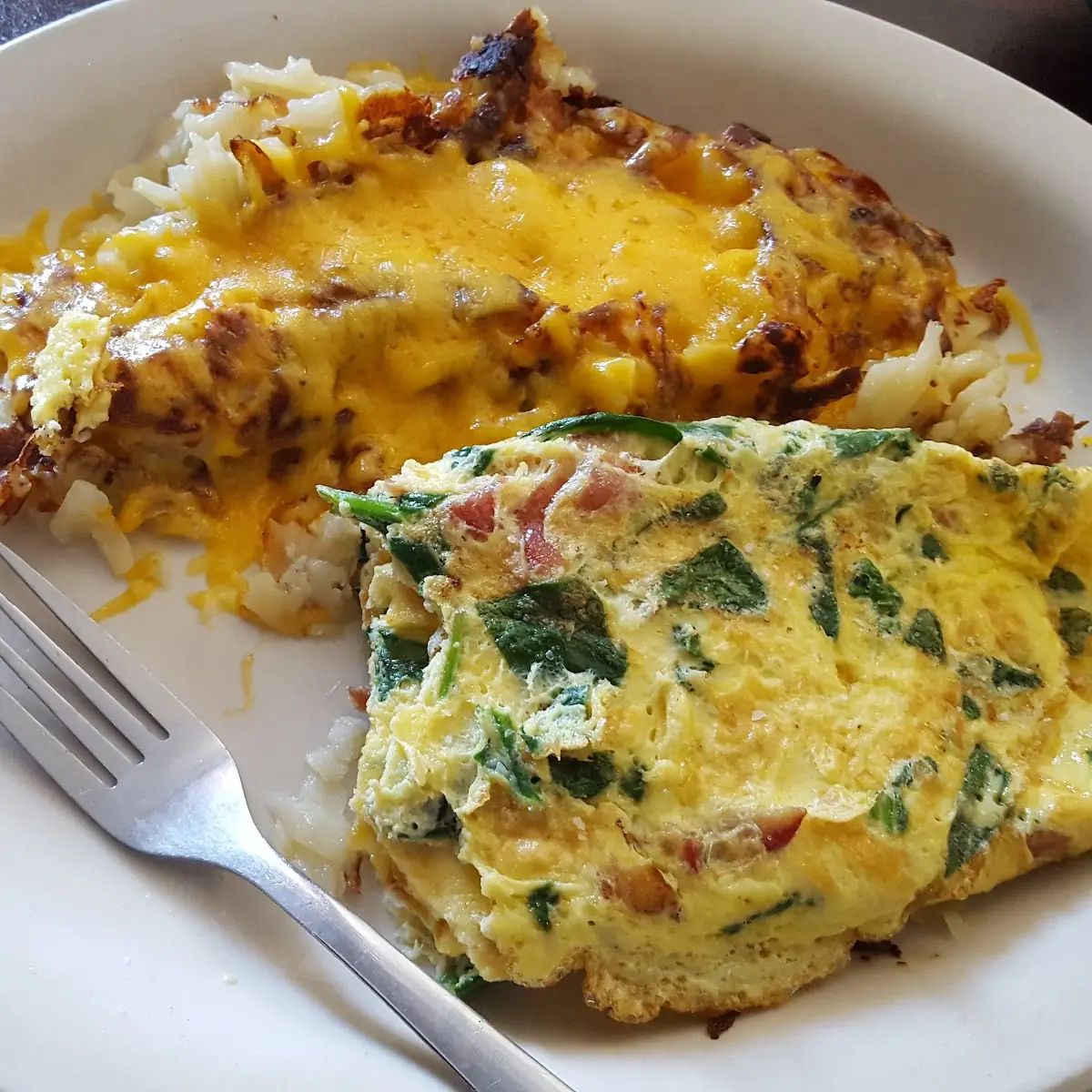 Spinich Bacon Omlette with Hash Browns with Cheese