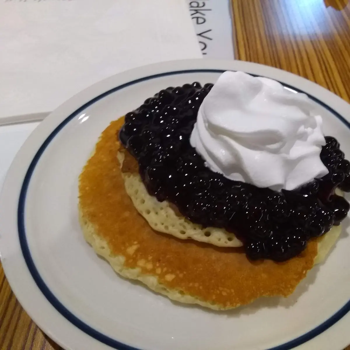 Stacked Pancakes with Blueberry Topping