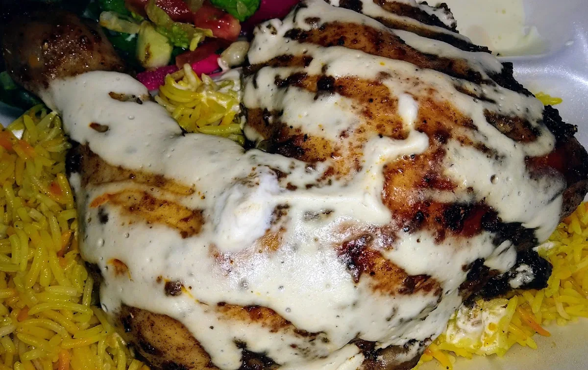 Rice with Chicken Leg and Hummus
