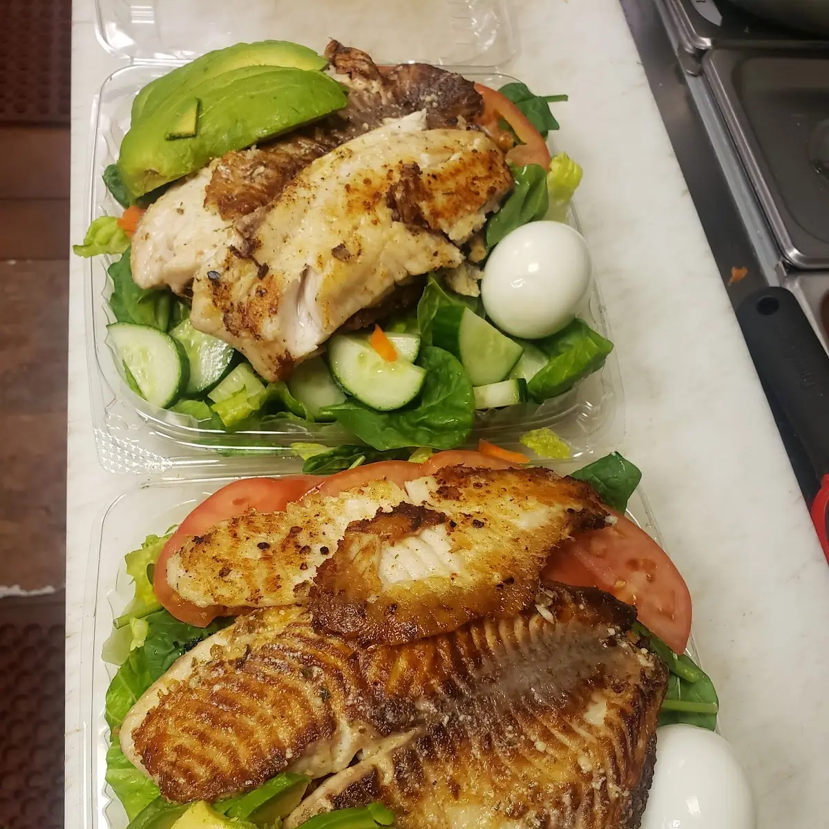 Grilled Tilapia over Spinach Salad