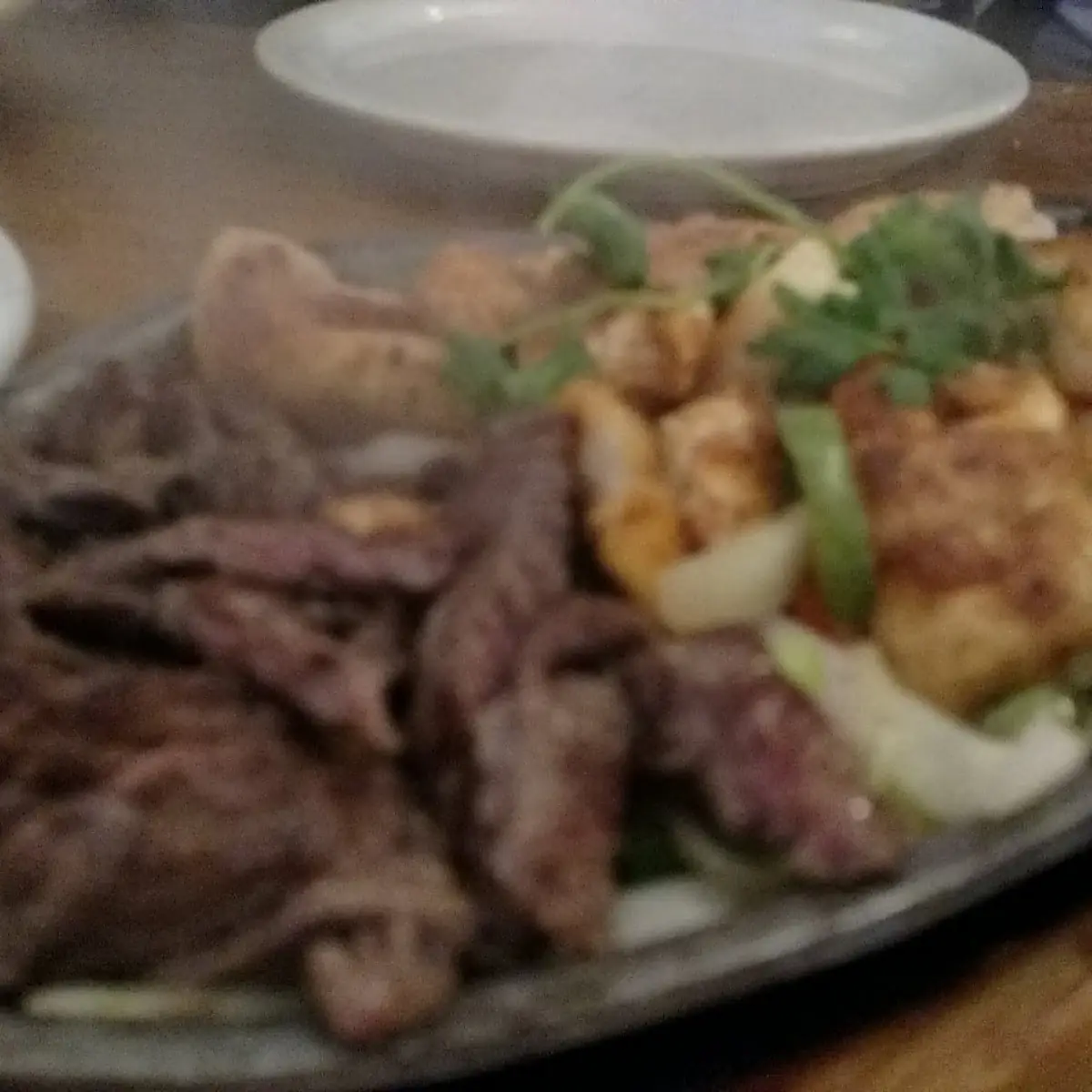 Steak Chicken and Shrimp Fajitas