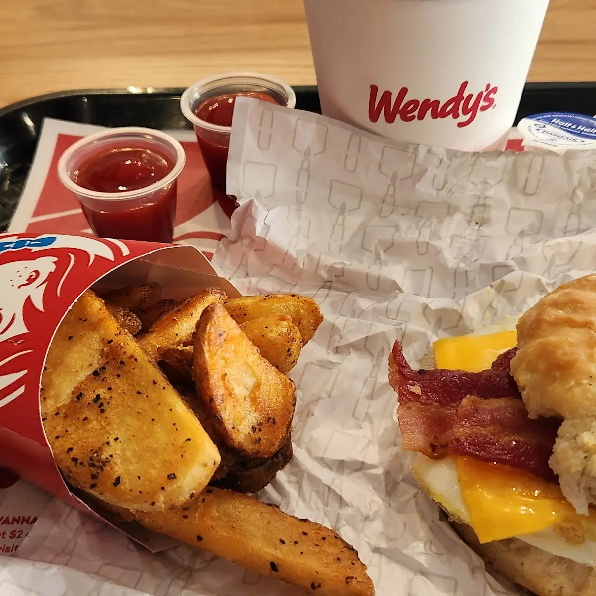 Homefries and Bacon Egg and Cheese Bisquit