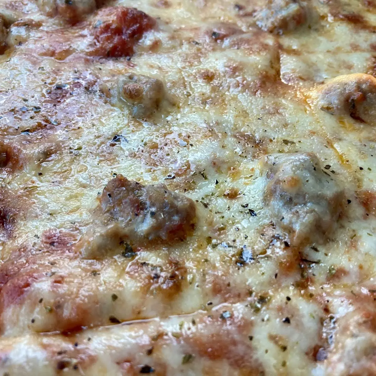 Thin Crust Cheese and Sausage Pizza