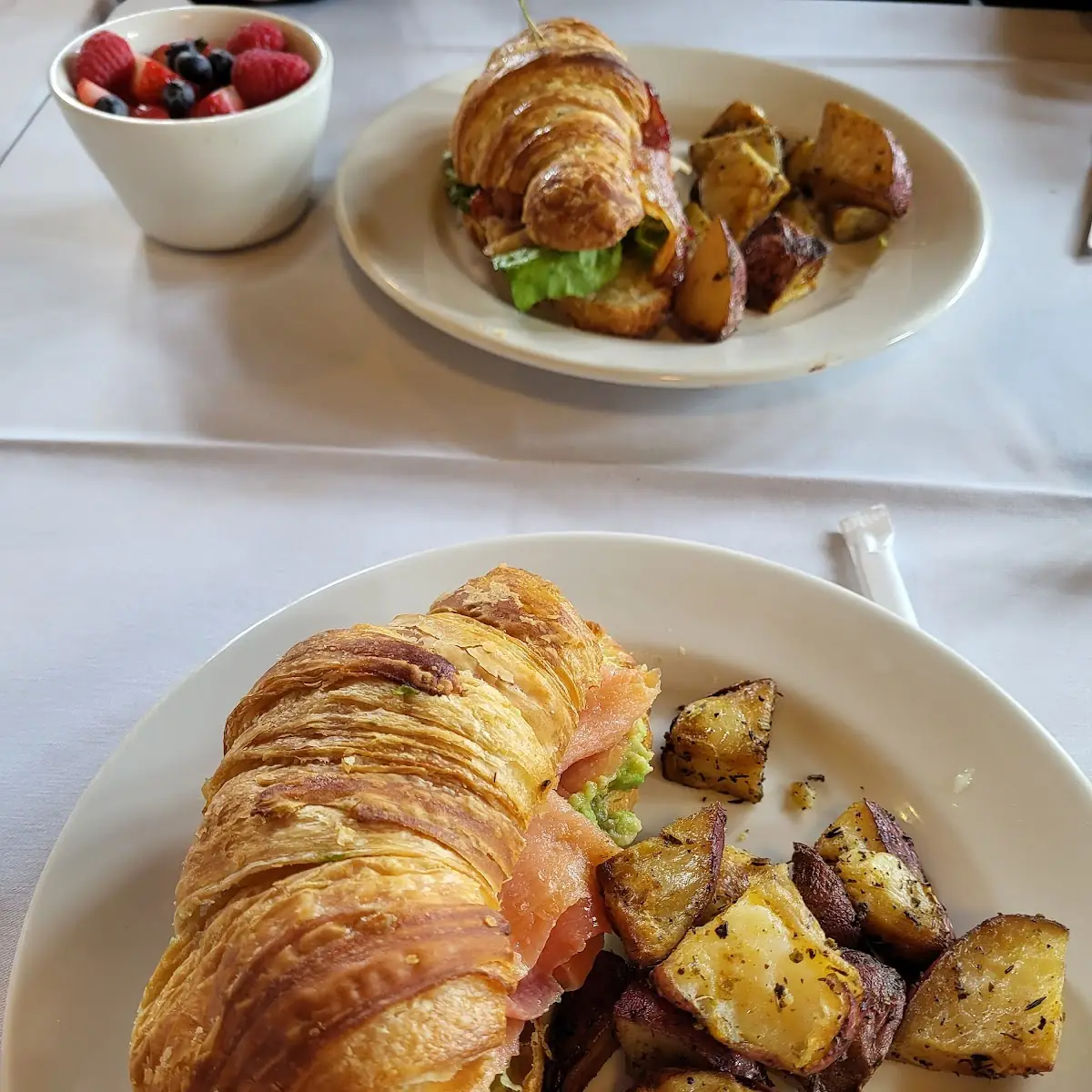 Smoked Salmon and Avocado Croissant with Roasted Potatoes
