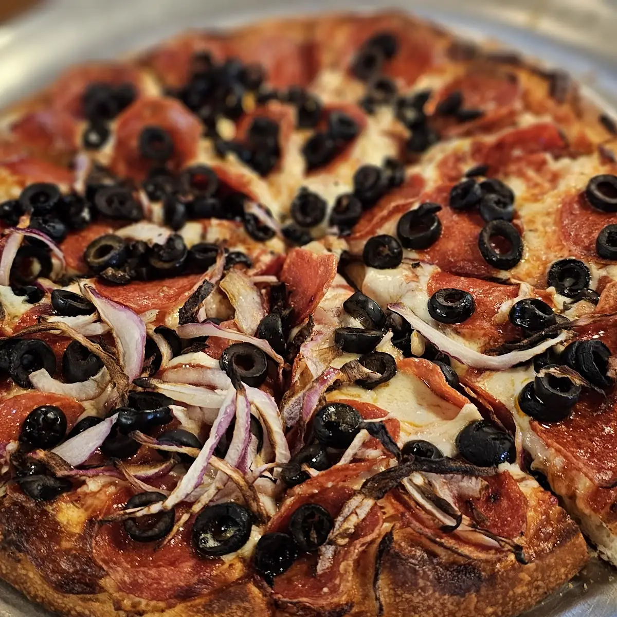 Pepperoni Pizza with Olives & 1 2 Onion