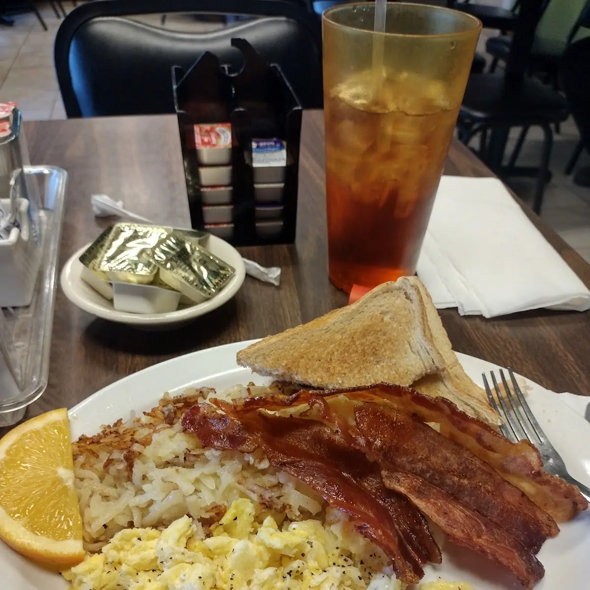 2 Egg Breakfast with Hash Browns Bacon and Toast