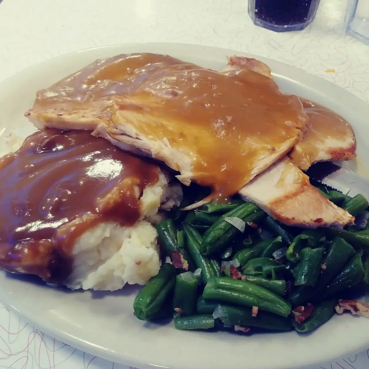 Smothered Pork Chop Breakfast