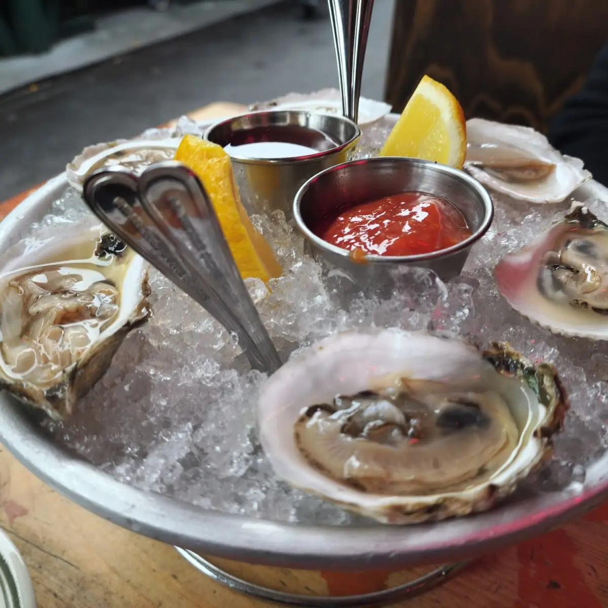 Oysters on Ice with Lemon Wedges