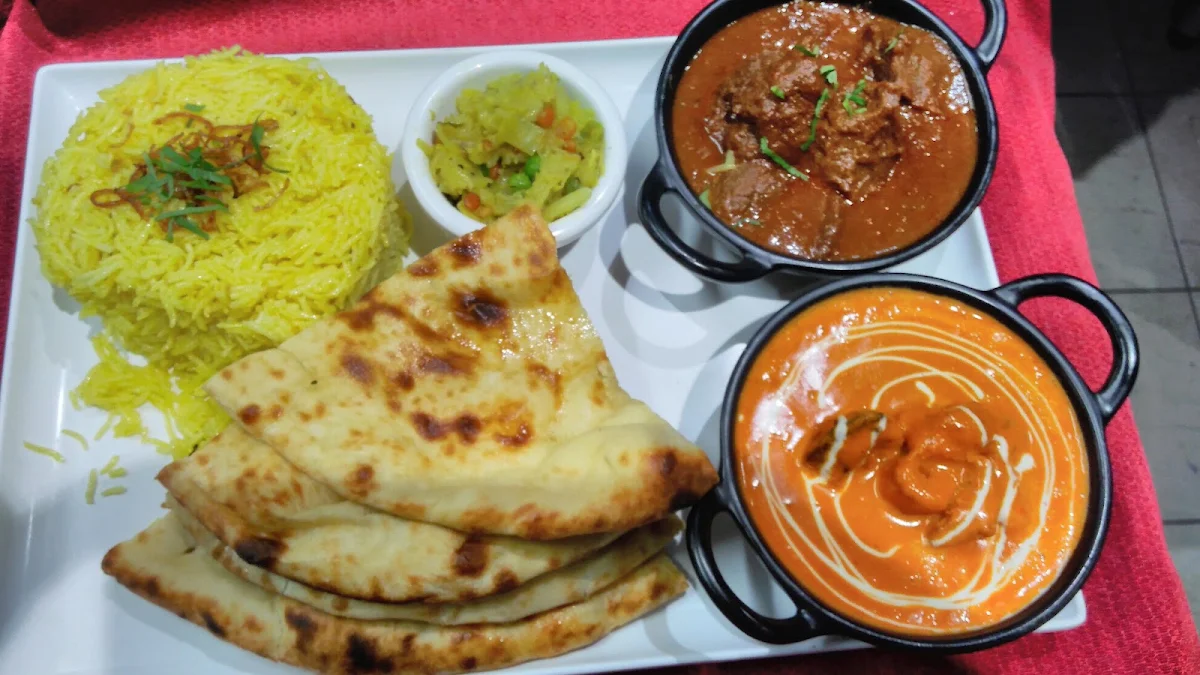 Butter Chicken or Paneer Makhani & Rice or Naan