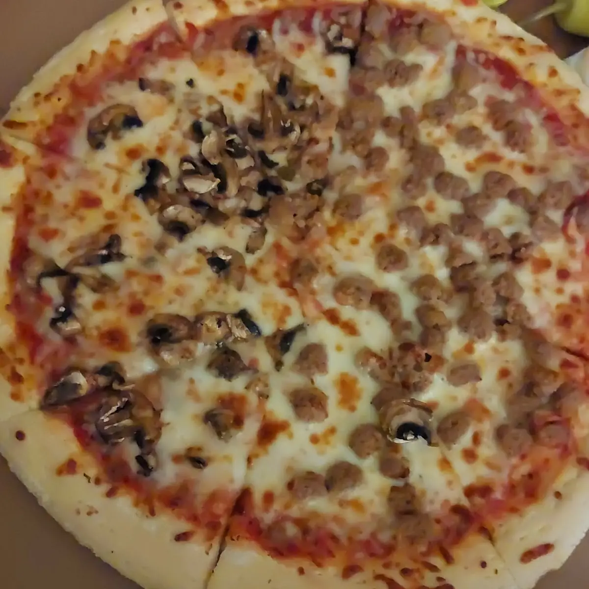 Half Mushroom Half Sausage Pizza