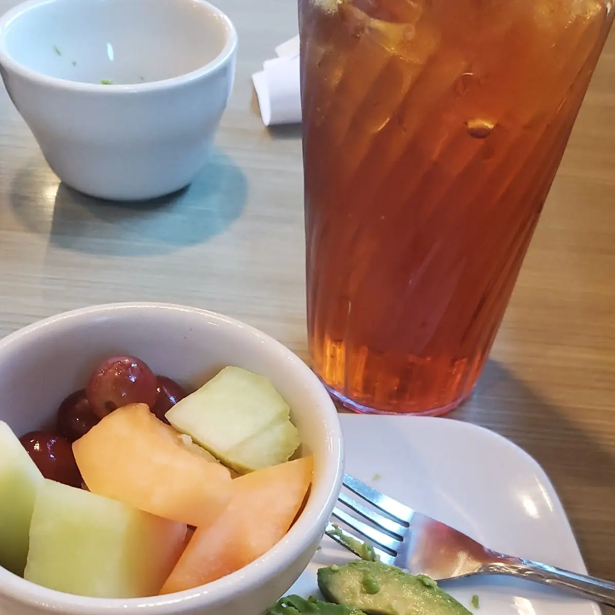 Sliced Avocado and a Fruit Bowl