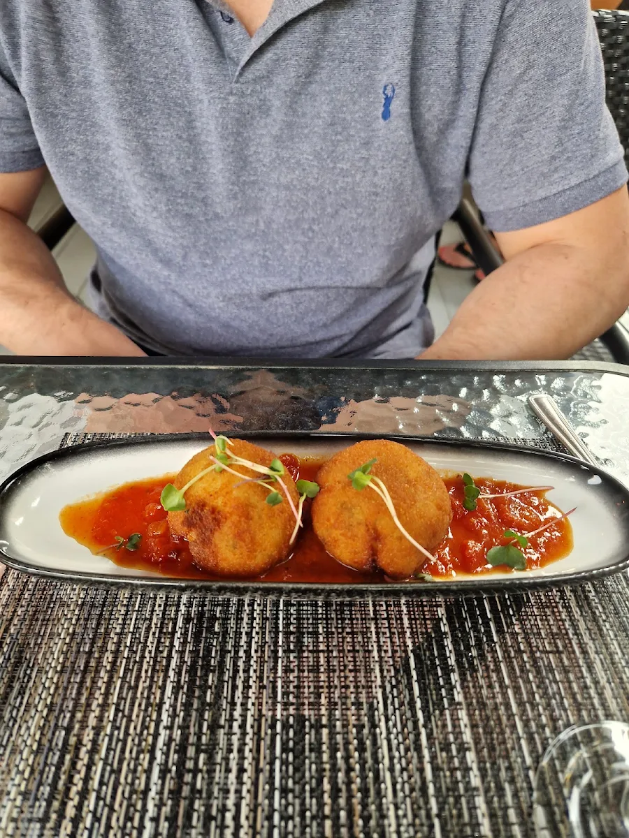 Arancini with Dried Tomatoes Parmesan and Basil Tomato Sauce Blanket