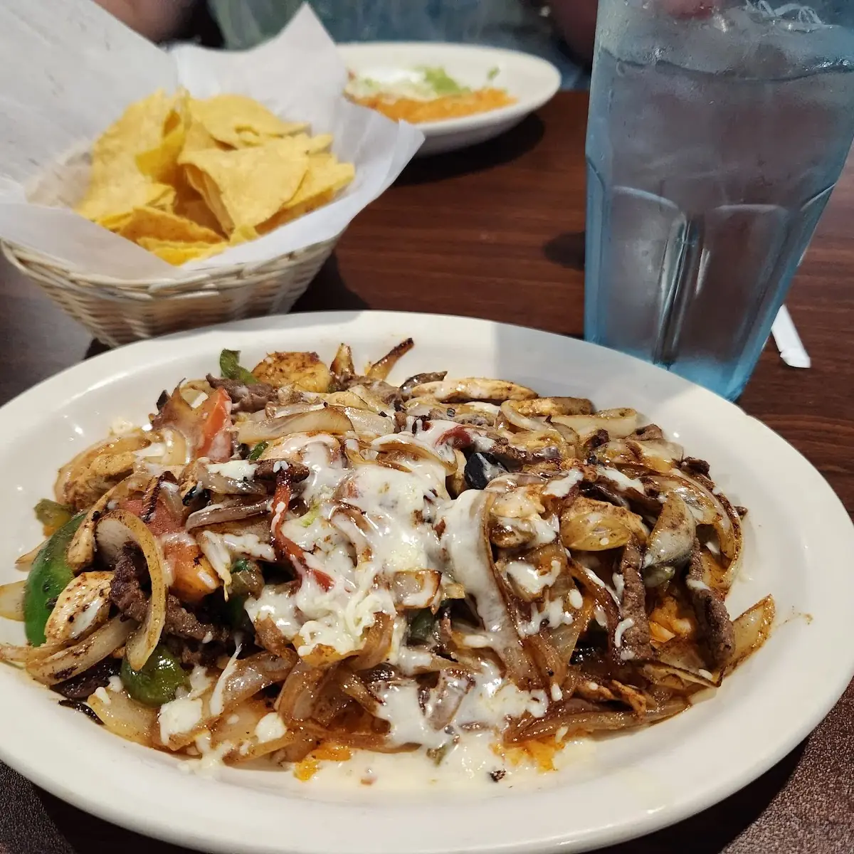 Steak Chicken and Shrimp Fajitas