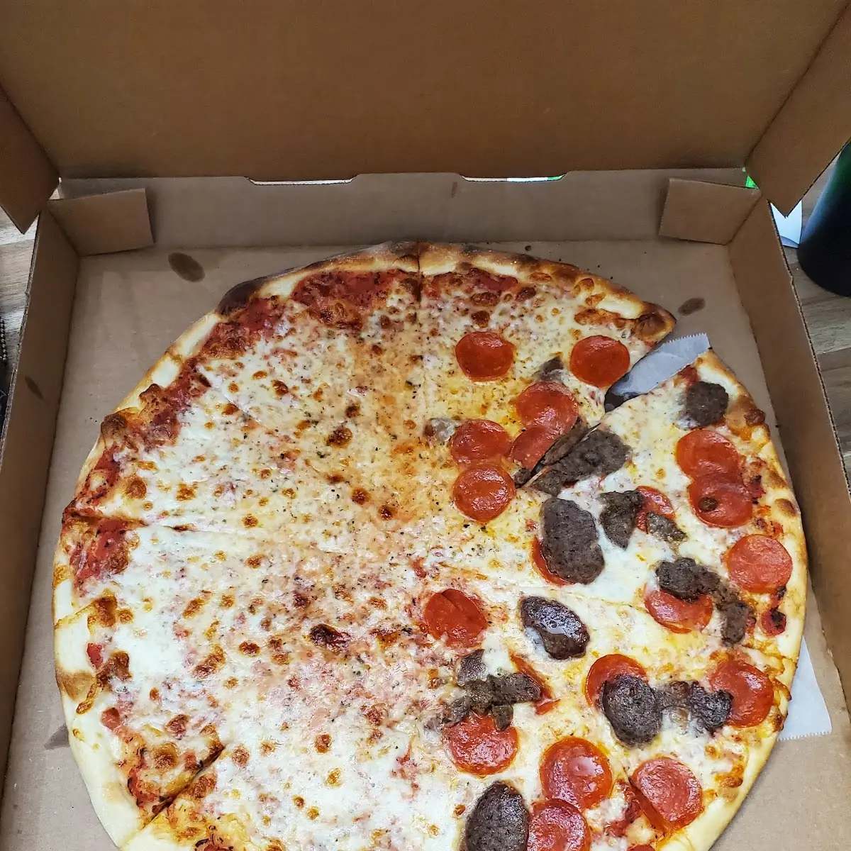 Half Pepperoni and Half Meatball Pizza