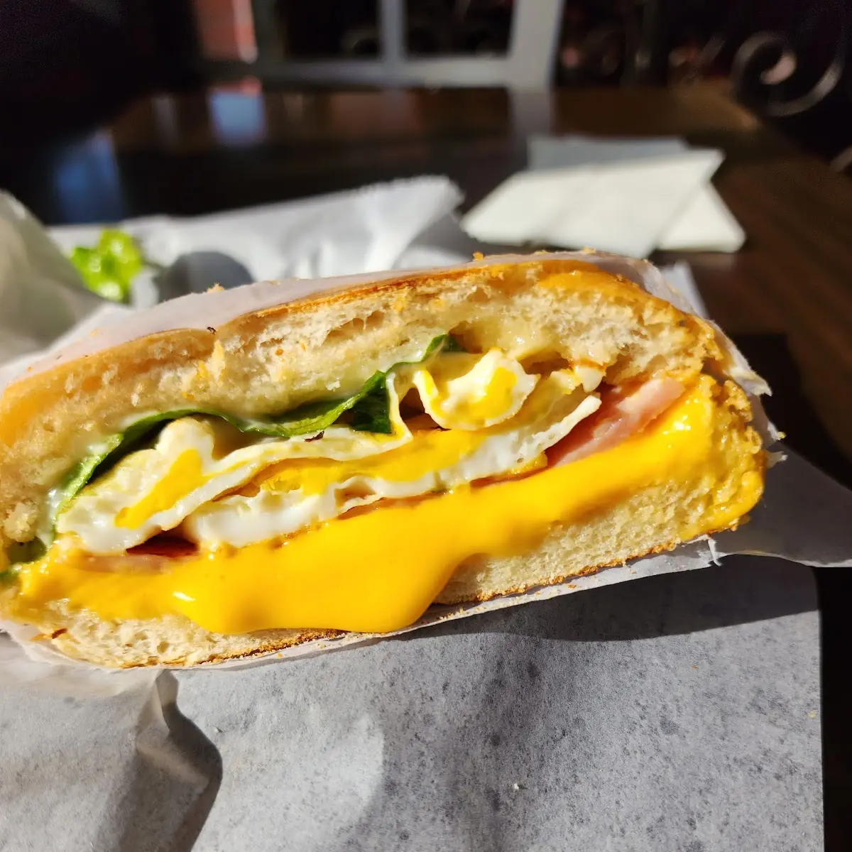Ham Egg and Cheese Sandwich with Lettuce