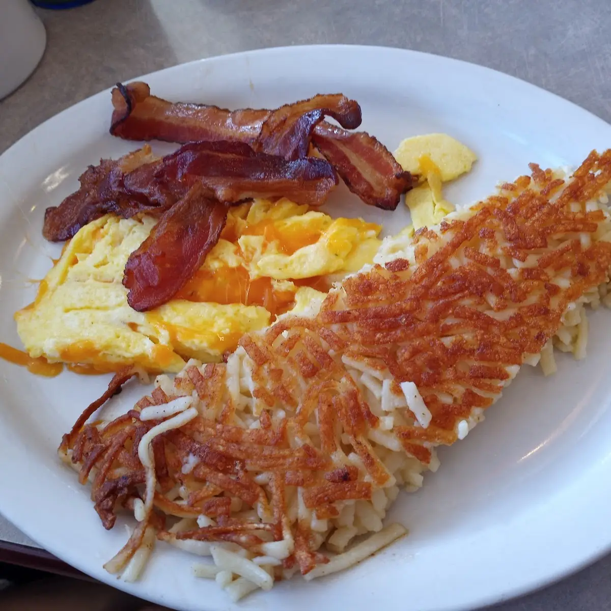 Two Eggs Any Style with Bacon