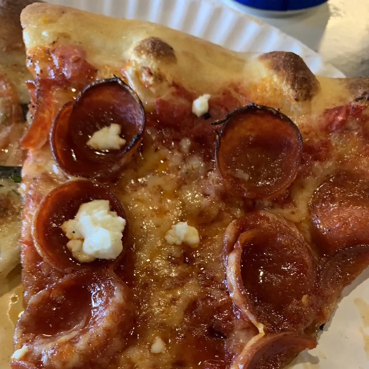 Pepperoni and Goat Cheese Pizza Slice