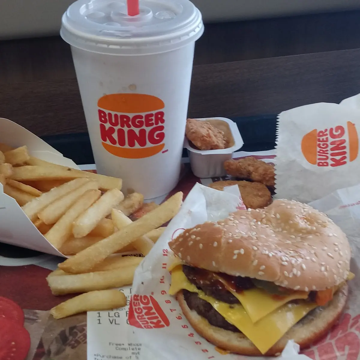 Double Cheeseburger 4 Piece Chicken Nugget with Honey Mustard Large Fry 1 00 and 1 00 Coke