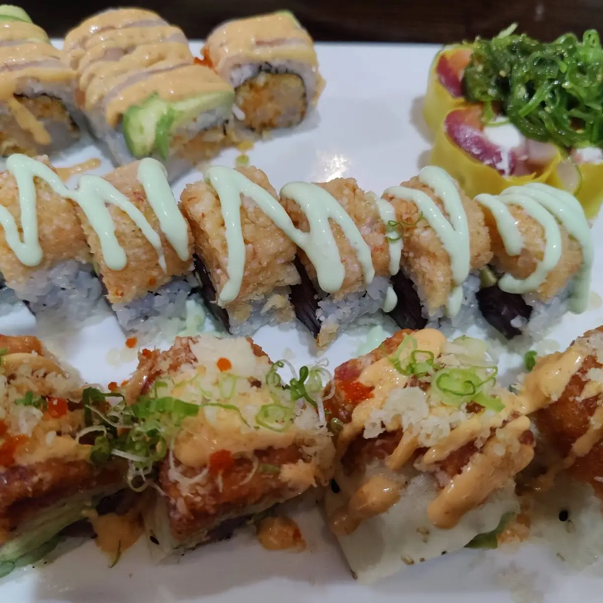 Wasabi Roll Mountain Roll Phoenix Roll & Sashimi Roll