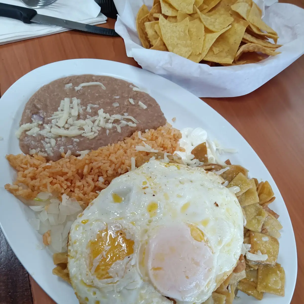 Green Chilaquiles with over Easy Eggs
