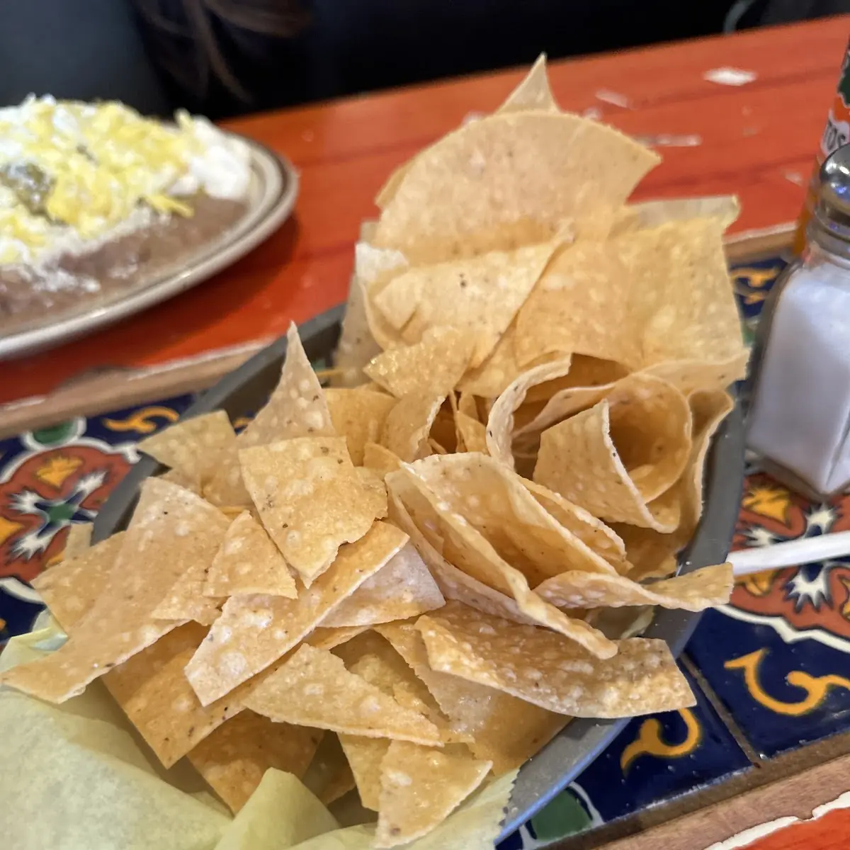 Chips Salsa and Refried Beans